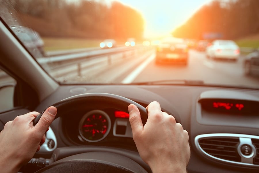 Closeup image of someone driving their car