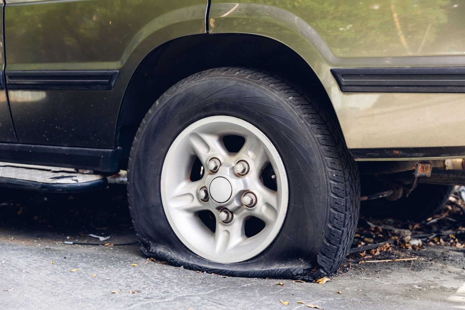 Closeup image of a tire blowout